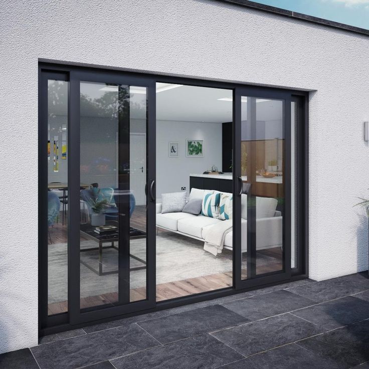 Dark-framed glazed door and window system shown as a supply and installation example